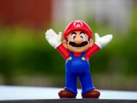 The sudden debut of Super Mario on the iPhone supports Nintendo’s share price