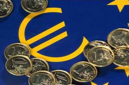 Euro rises in volatile trading after an earlier decline